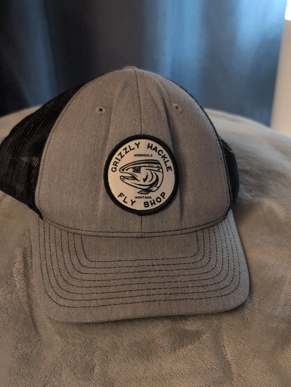 Grizzly Hackle Fly Shop Gray and Black Trucker Cap
